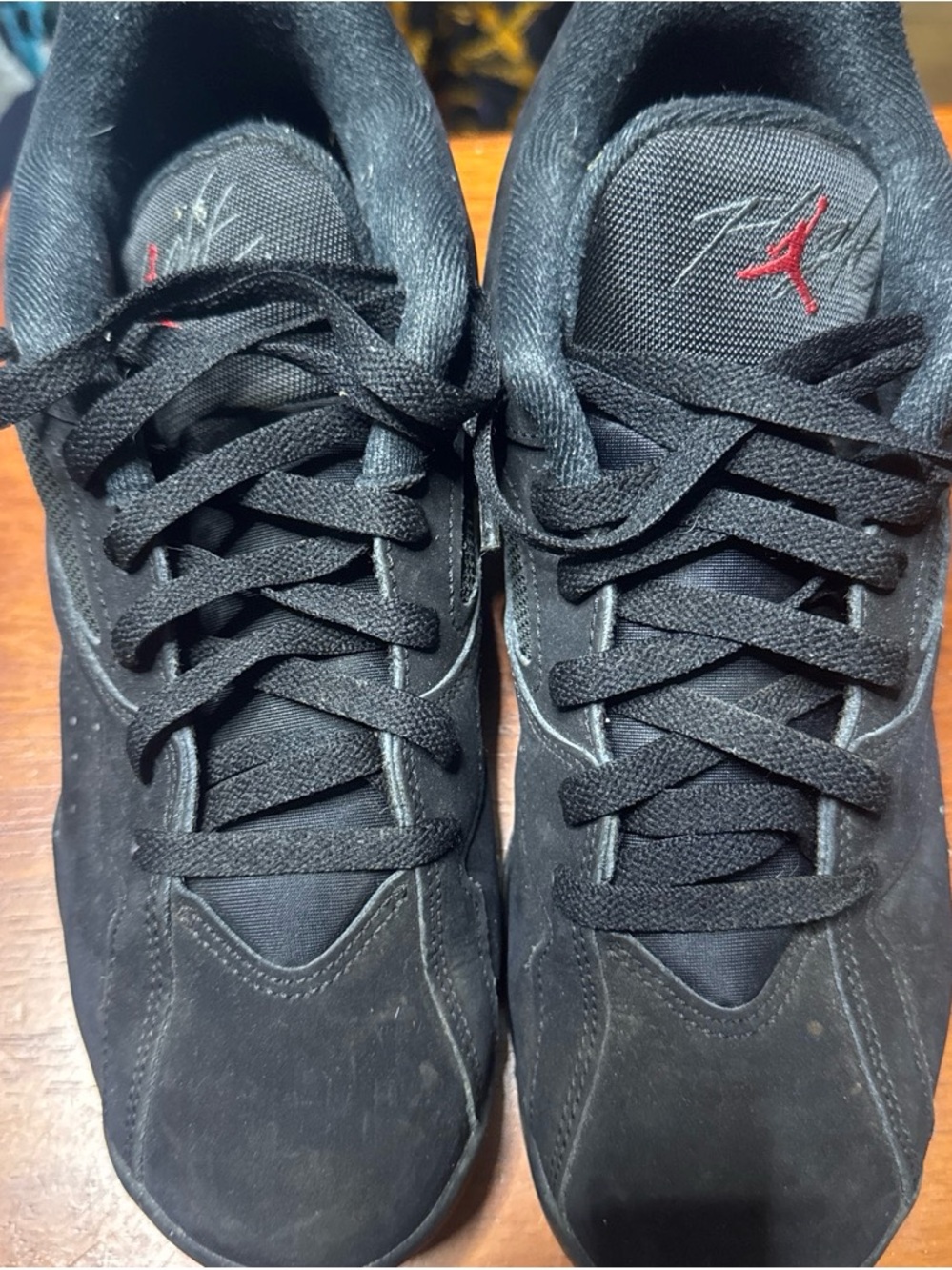Jordan Black Sneakers with Red Jumpman Accent